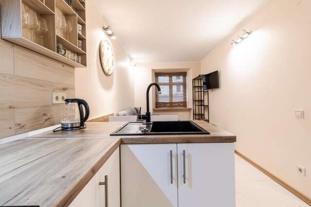 Апартаменты Staroevreyska timber apartment Львов-14